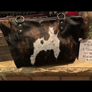 Jill’s Homestead new never used Daisy bag-hair on hide with black leather back
